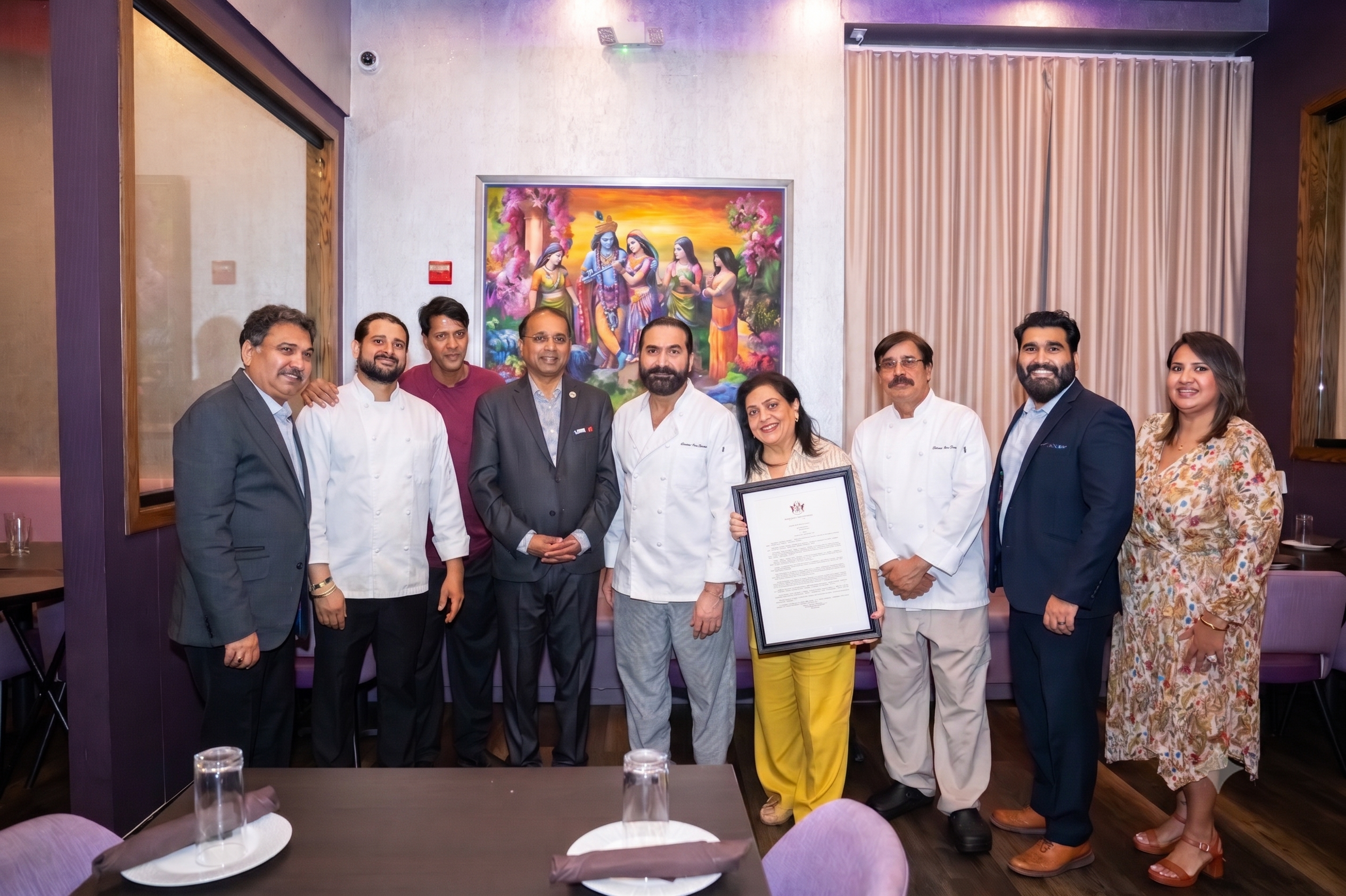 Chef Rupa Vira and the culinary team at Celebration by Rupa Vira with Senator Kannan Srinivasan holding Virginia Senate Resolution No. 158, Ashburn VA