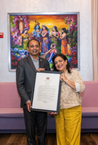 Senator Kannan Srinivasan presenting Virginia Senate Resolution SR-158 to Chef Rupa Vira at Celebration by Rupa Vira, June 2026